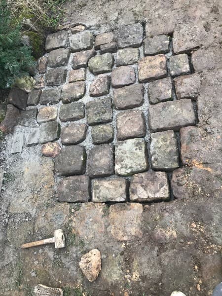 Réparation cour extérieure endommagée - Après